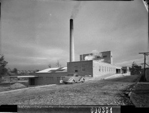 Boiler-house with smoke-stack and Red Cross on roof, Ya...