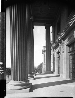 Exterior, showing the entrance porch and columns, Mitch...