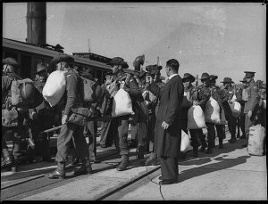 A.B.C. recording soldiers of the 2/4th Infantry off to ...