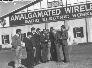 Group of young male workers outside Amalgamated Wireles...