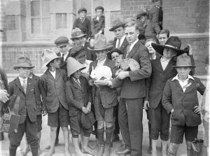 Fort Street schoolboys being shown rabbit fur felt hat-...