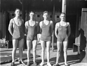 Three male swimmers. "I think 3rd from left is Noel Rya...