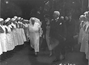 Matron and official party inspect parade of nurses