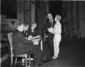 Theatre backstage rehearsals.  Actor and actress readin...