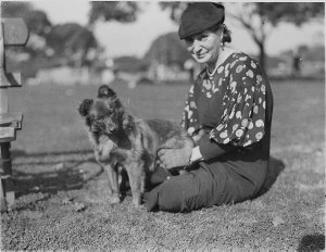 Unidentified woman with her puppy