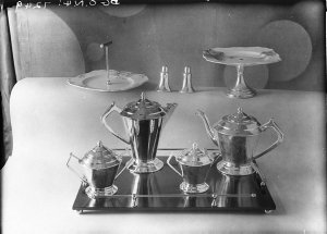 A silver tea service on a tray