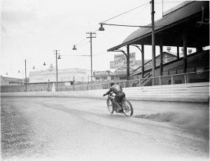 Dirt-track riders at practice; daytime