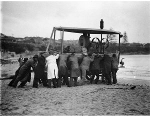 Raising a sunken power barge from harbour bed [i.e. Div...