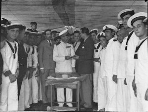 Presents to Italian Commander of battleship from Italia...