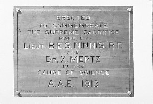 H696: The inscription on tablet below the memorial cros...