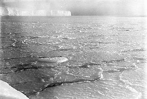 W060: Commonwealth Bay covered with young ice / Frank H...
