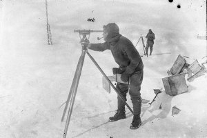 H062: Kennedy taking observations with theodolite / Fra...