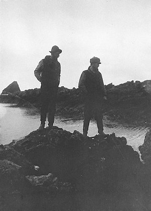 Q229: Davis and Mawson examining Aerial Cove, Macquarie...
