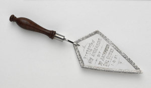[Silver cake trowel] Presented to Mrs Anderson by 1st A...