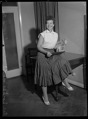 Airline hostess from Honolulu models clothes, 10 March ...