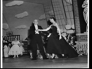 Margot Fonteyn in a Dior evening gown takes a curtain c...