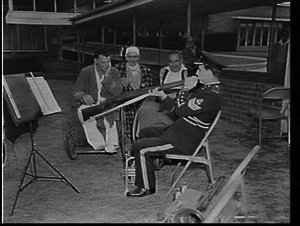 Corporal James Stryker, RAAF central band, blowing bugl...