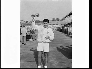 Ashley Cooper wins the 1957 N.S.W. men's singles tennis...