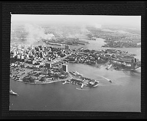 File 002: Aerial view of Bennelong Point before commencement of Sydney Opera House, 1958 / photographs by Max Dupain