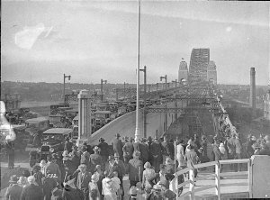 Motor cars and pedestrians cross the Bridge, Sydney Har...
