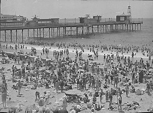 Coogee Beach and pier with summer crowd
