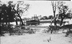 Paddle steamer "Captain Stuart" with barge of gravel on...