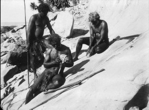 Aboriginal men making stone implements - Port Macquarie area, NSW