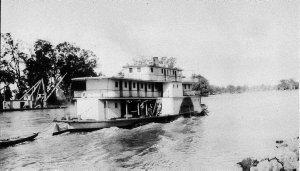 Passenger paddle steamer "Ruby" going downstream after ...