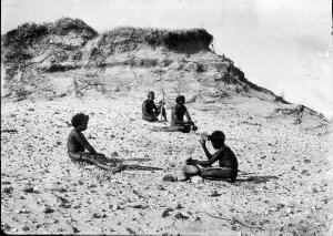 Aborigines making stone implements on Aboriginal field - Port Macquarie area, NSW