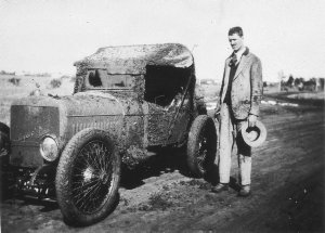 Hispano Suiza car covered in mud. "Just outside Griffit...