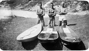 Three men with surf skis at Town Beach. Ray Dick bought...