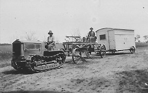 Tractor towing grader towing caravan, near Forest Creek...