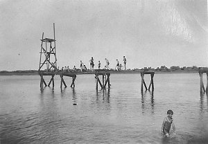 Swimmers on the old pump at the Newey Tank. "The Cobar ...