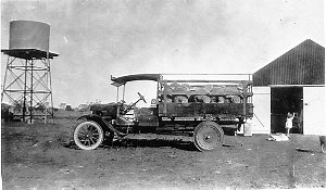 1918 T Model Ford truck with load of rams on way to Mor...