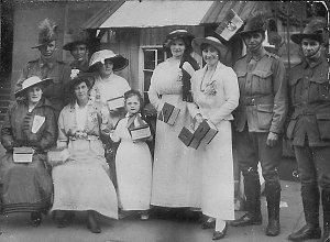 Woman and soldiers collecting money on Allies' Day in M...