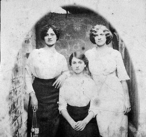 Three female servants. The elder one on the left has a ...