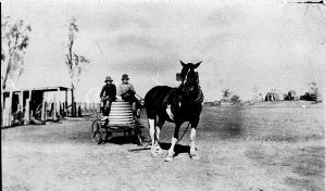 The old fashioned way of carting water during the droug...
