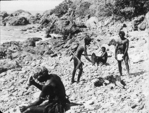 Aboriginal men selecting stones for axes and implements...