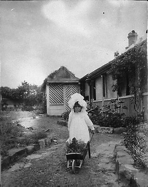 Girl with wheelbarrow. Tabulum was destroyed by fire in...