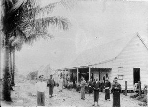 Group of Japanese in front of house - Geraldton, Qld