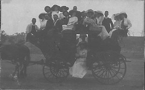 Group of people on horsedrawn coach - Bega area, NSW