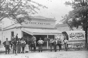 Group outside Coach Factory including F.L. Vines, Fruit...