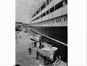 Ocean liner Dominion Monarch berthed in Sydney Harbour