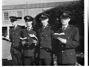 Young men from the country graduate as police officers,...