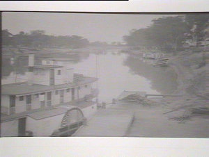 (MM). Paddle steamer/riverboat with small punt
