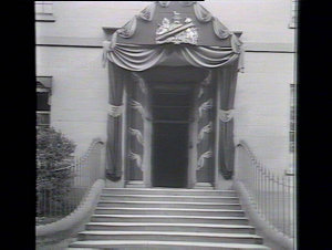 Main entrance, Public Instruction, draped