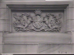 Coats of arms carved on stone outside Government House