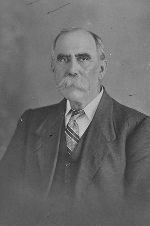 Mr. J. Estell, Minister for Labour