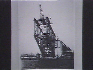 Arch of Sydney Harbour Bridge commenced.