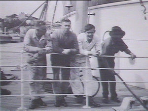 Four workmen on fore-dock, Captain Cook III